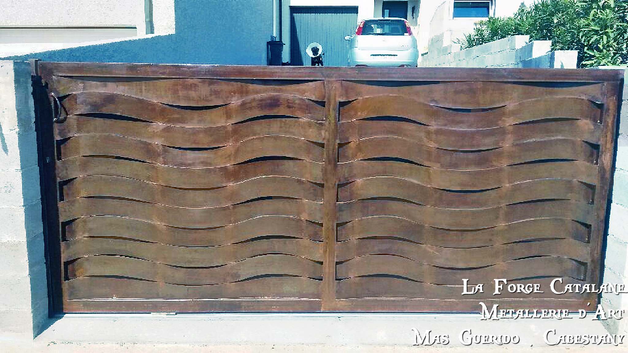 Portail tole effet lames tresses rouille vannerie  forge catalane.jpg